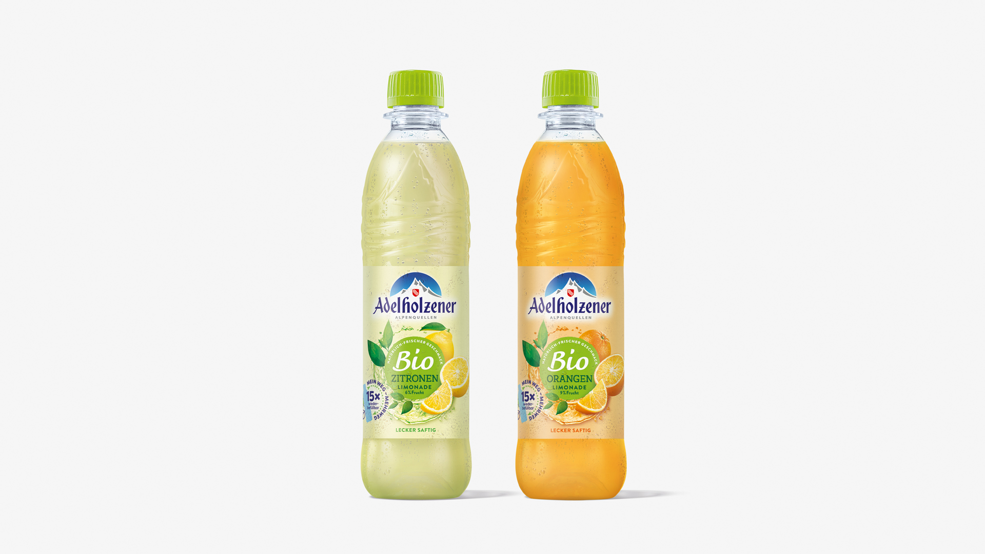 Zwei  Biolimonaden von Adelholzener, Orange und Zitrone, im neuen, leckeren, saftigen Look von Verpackungsdesign Agentur HAJOK