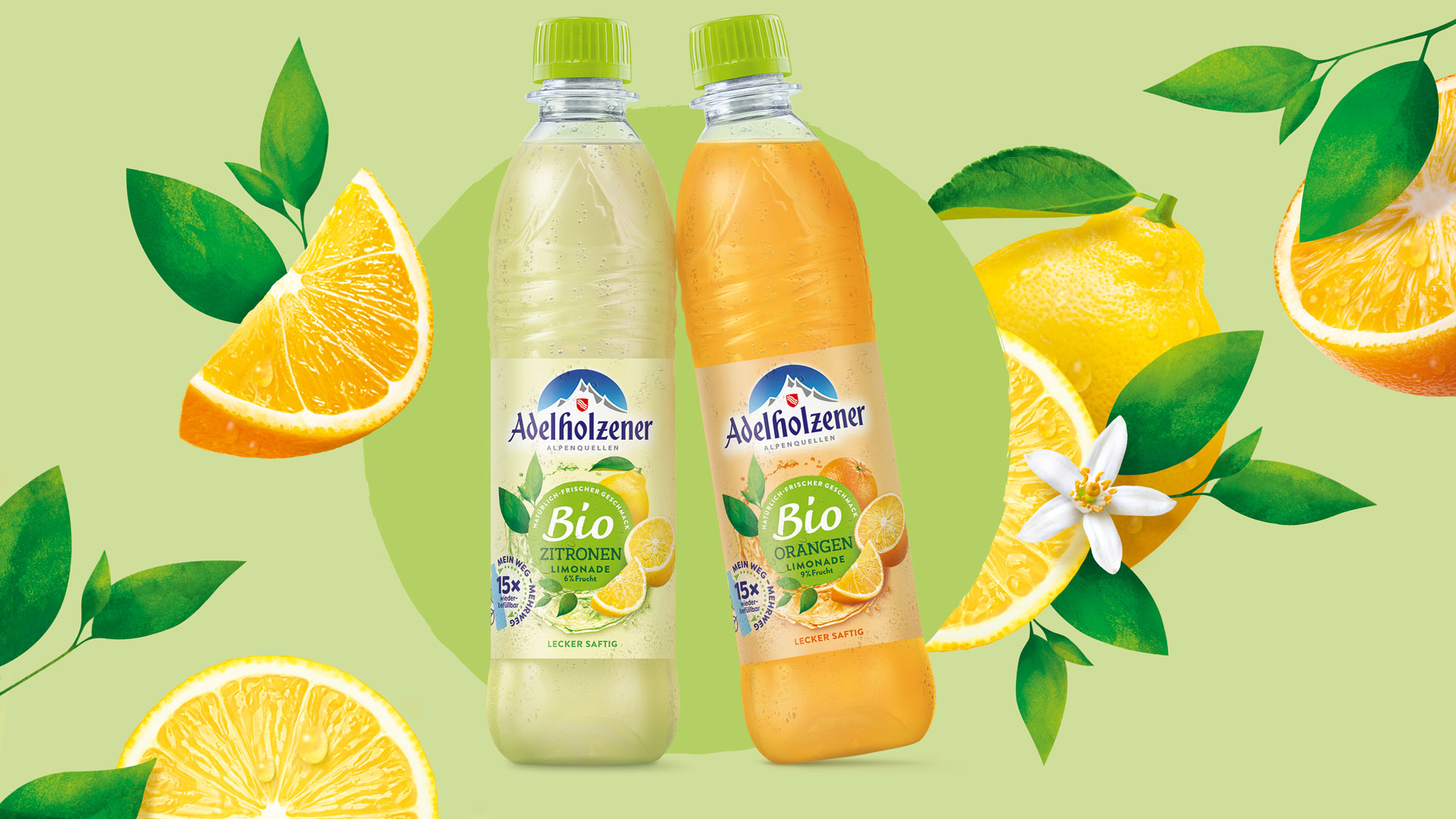 Zwei  Biolimonaden von Adelholzener, Orange und Zitrone, im neuen, leckeren, saftigen Look von Verpackungsdesign Agentur HAJOK