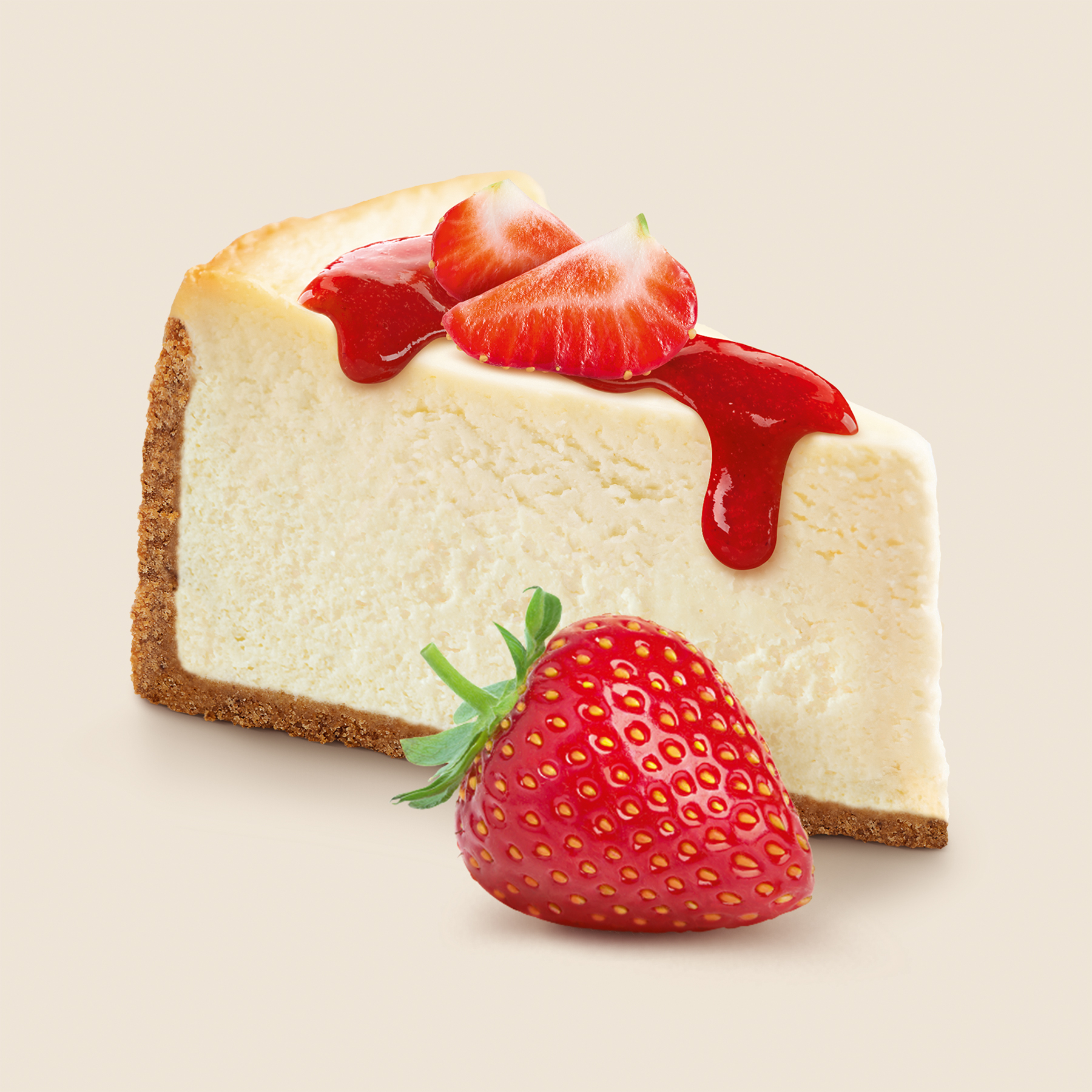 Foodfotografie Cheesecake mit Erdbeersoße und Erdbeeren