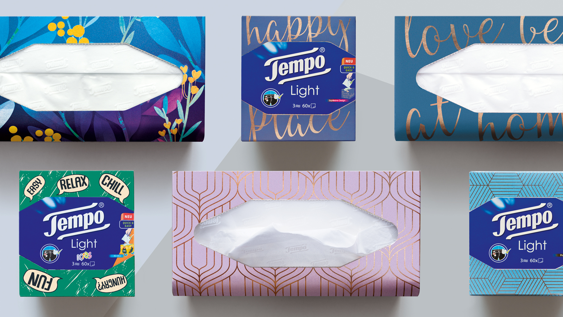 Sechs verschiedene Tempo Taschentuchboxen im modernen Design – von floralen Motiven über geometrische Muster bis hin zu verspielten Schriftzügen wie ‚happy place‘ und ‚love at home‘ – zeigen die Vielfalt der Tempo Light Edition.